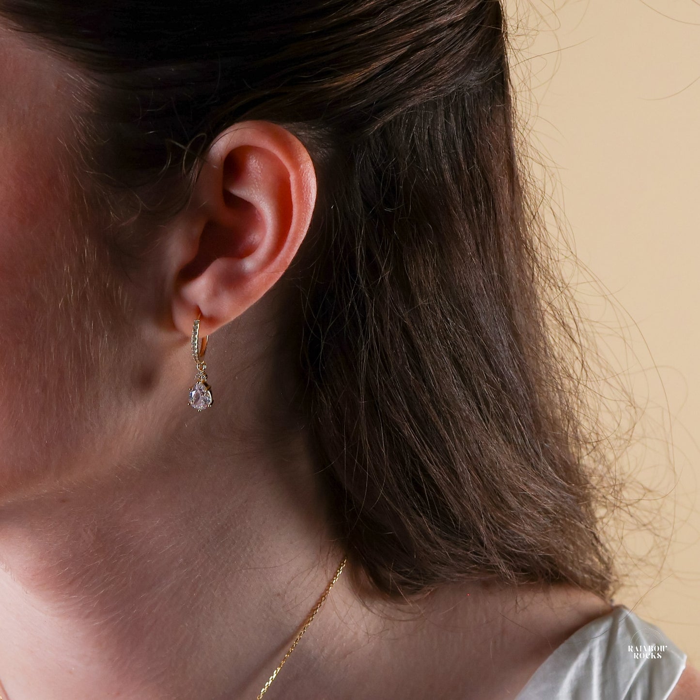 model wearing the Diamond Cz Hoop Earrings 14K Gold Vermeil