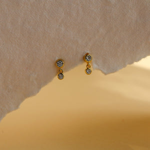 Leda dainty double drop stud earrings in 18K gold plated sterling silver, a 2.5mm bezel CZ stud with a 2mm CZ drop