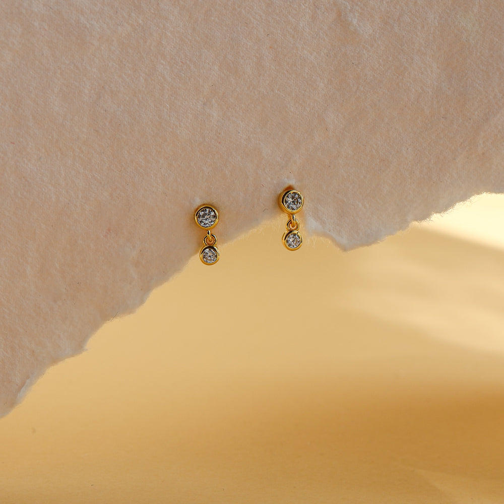 Leda dainty double drop stud earrings in 18K gold plated sterling silver, a 2.5mm bezel CZ stud with a 2mm CZ drop