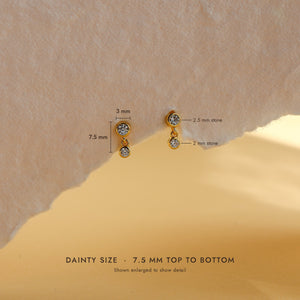 Leda earring size guide: 7.5mm long, 3mm wide, with 2.5mm and 2mm cubic zirconia stones
