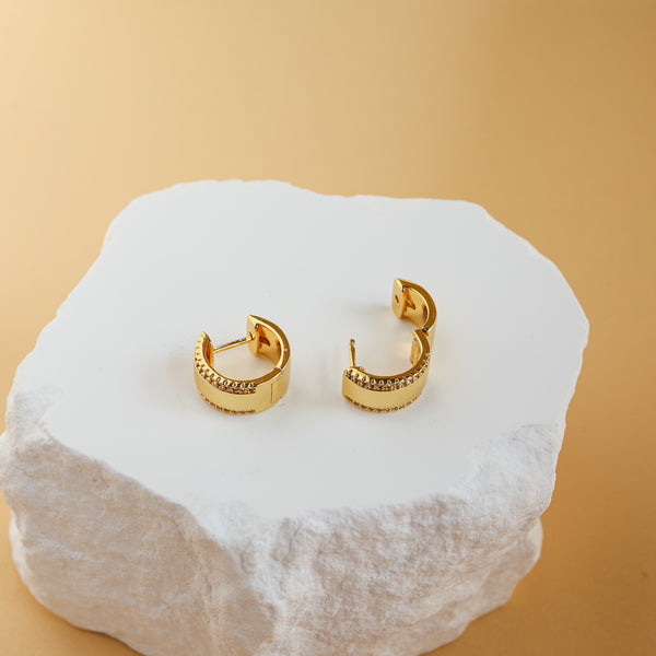 Luna wide gold huggie hoop earrings, alternate angle - Rainbow Rocks