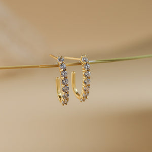 Carina CZ J-hoop earrings showing the plain polished gold back and CZ front - Rainbow Rocks