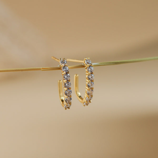 Carina CZ J-hoop earrings showing the plain polished gold back and CZ front - Rainbow Rocks