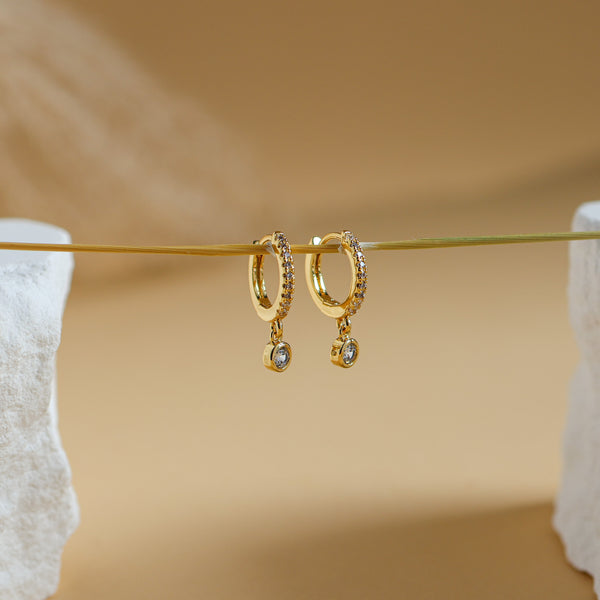 Pair of small gold pavé huggie hoops with bezel-set 3mm CZ drops, Rhea earrings by Rainbow Rocks