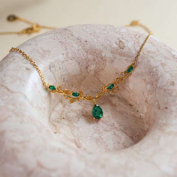 Vine lab emerald pear-cut necklace detail - Rainbow Rocks