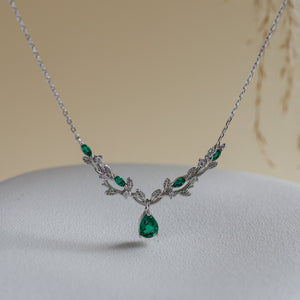 Vine lab emerald pear-cut necklace styled - Rainbow Rocks