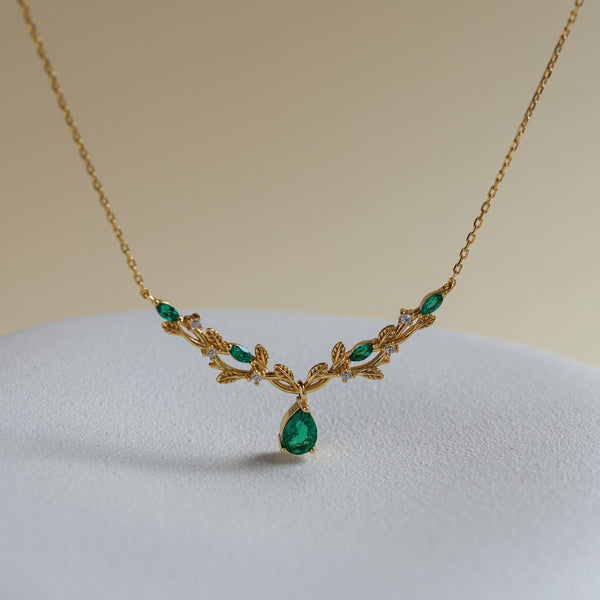 Vine lab emerald pear-cut necklace styled - Rainbow Rocks