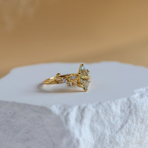 Side view of the Vine Natural Aquamarine Ring in 14K gold vermeil showing the leaf detail and CZ accents - Rainbow Rocks Jewellery