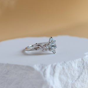 Side view of the Vine Natural Aquamarine Ring in sterling silver showing the leaf detail and CZ accents - Rainbow Rocks Jewellery
